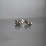 Seafoam ear cuff in sterling silver set with a small dark stone