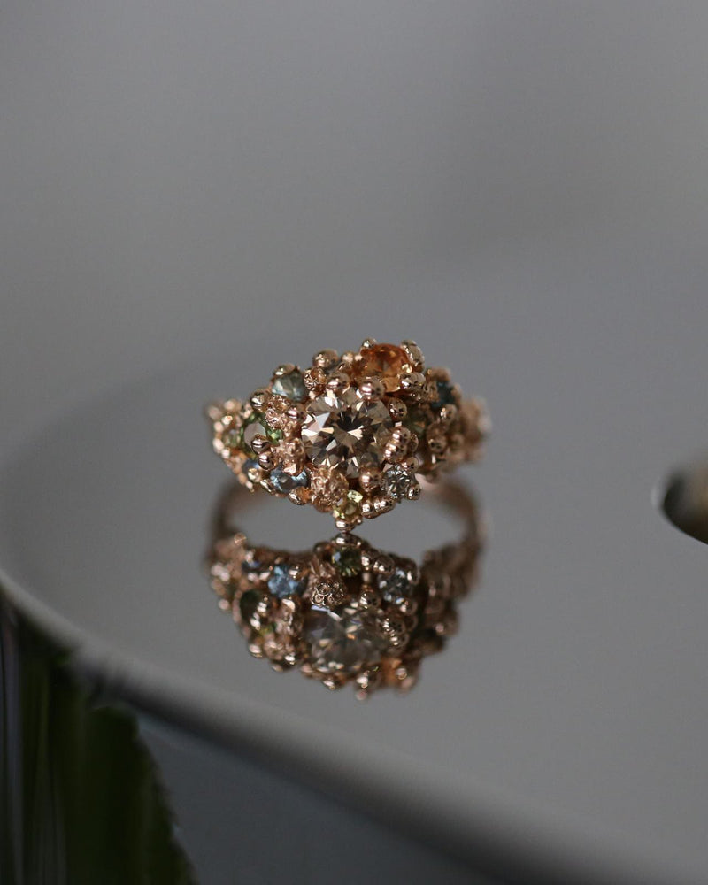 Champagne diamond cluster ring with sapphires