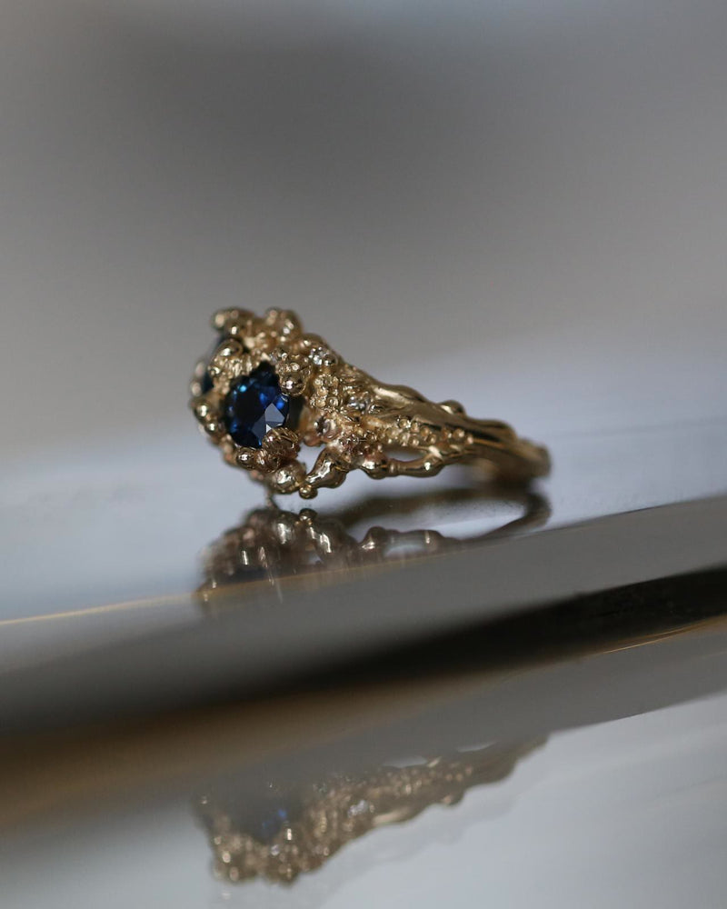 Sapphire and gold organic ring